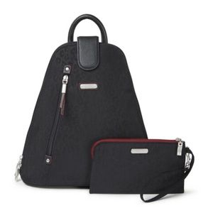 NWT Baggallini Metro Backpack with RFID phone wristlet. Black cheetah print.